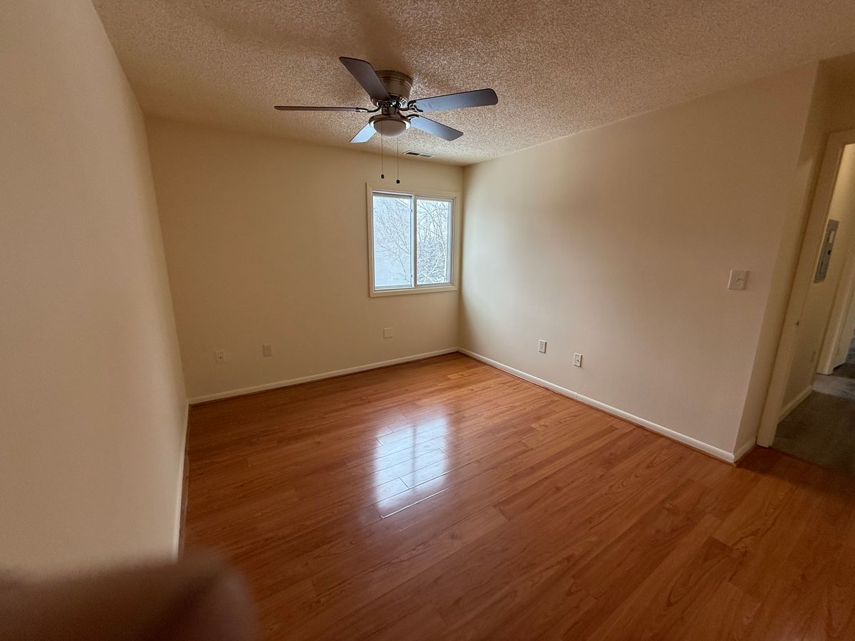 Second bedroom with hardwood floors